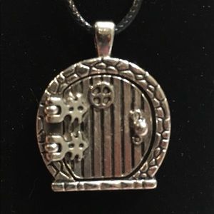 Metal fairy door necklace